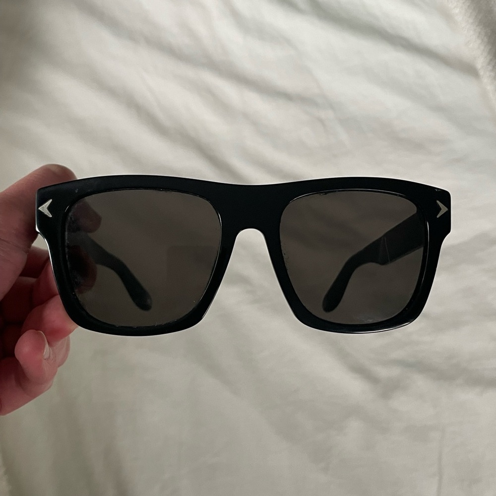 Selling a pair of authentic Givenchy 55mm square sunglasses in black.Gently used
